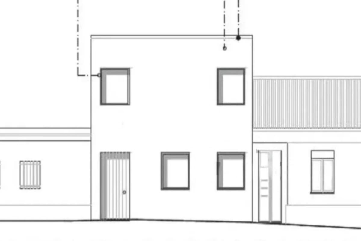 A line elevation drawing of a two-storey house with a flat roof